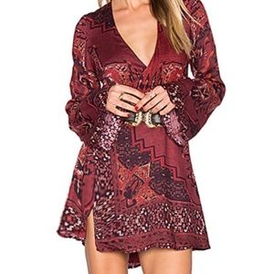 The Jet Set Diaries maroon patterned dress.